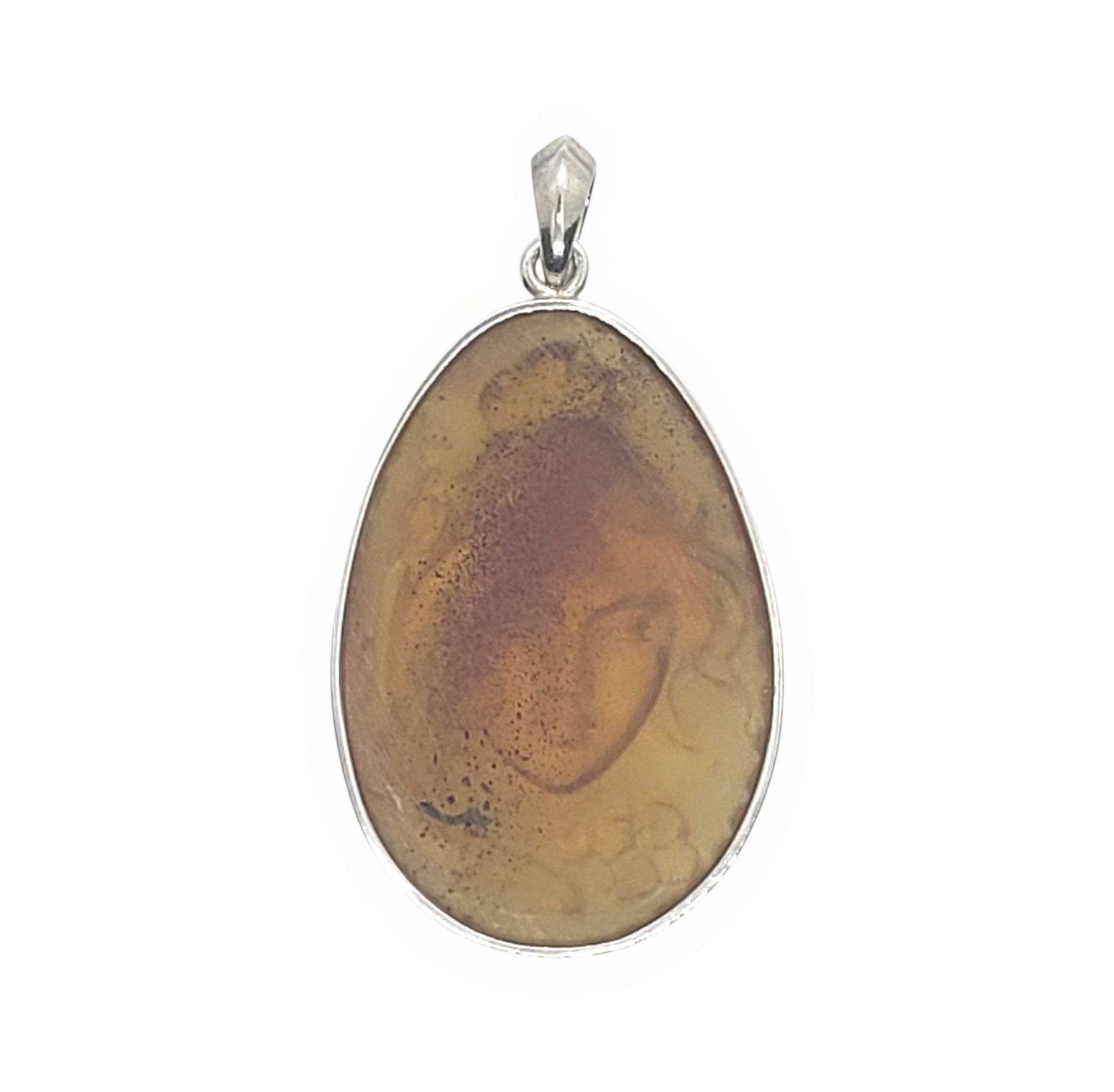 Back of a Dominican Amber Cameo Pendant