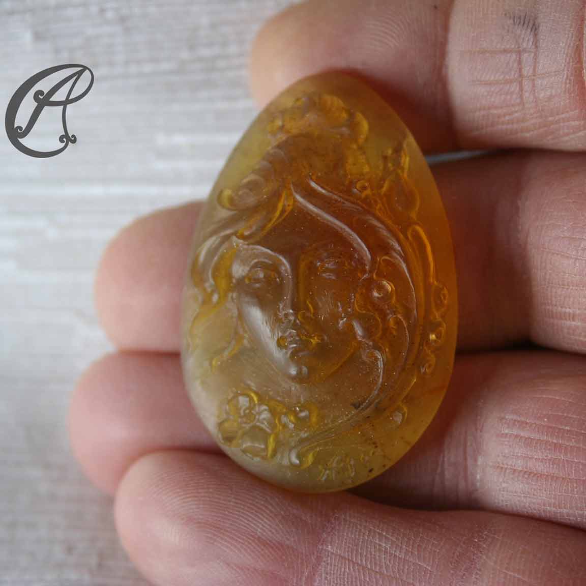 Dominican Amber Cameo carved by Italian cameo artisan Agostino Centobelli
