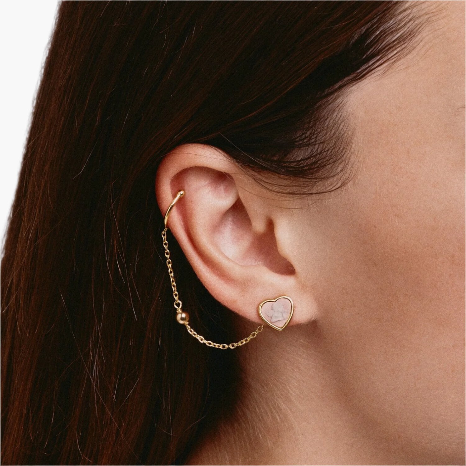 Cherub Earrings, how to wear them.  Cameo Calamity model  has chosen the light pink version of the Cherub Single Earring.